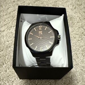 Elegant Black and Rose Gold Men's Watch
